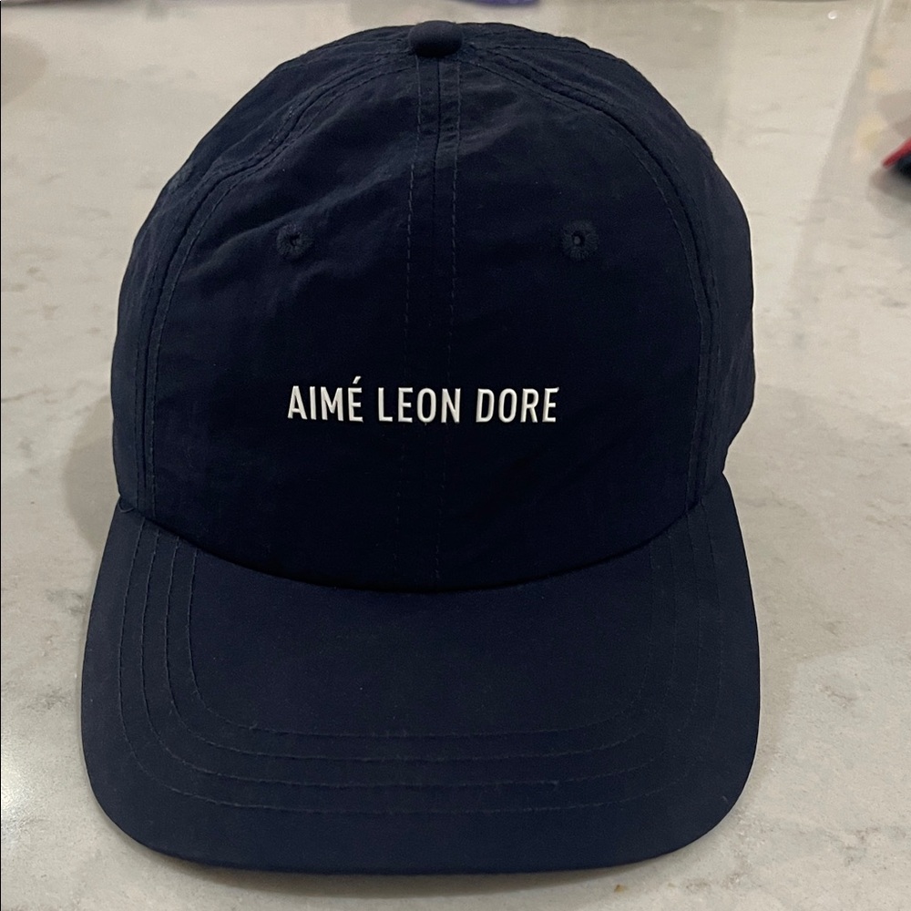 Aime Leon Dore navy blue nylon logo strapback with black nylon strap worn twice
